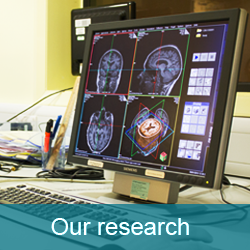 Image of computer screen with a picture of a brain scan being shown